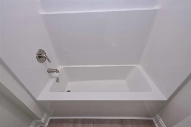 a bathroom with bathtub