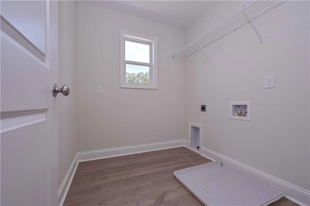 262 Corinth-Five Points Road Buchanan, GA 30113 - Photo 30 of 41 a view of a room with wooden floor and window