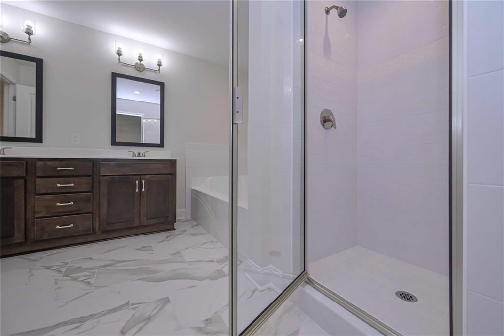 262 Corinth-Five Points Road Buchanan, GA 30113 - Photo 36 of 41 a bathroom with a sink and a mirror