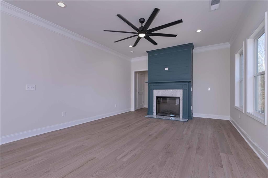 262 Corinth-Five Points Road Buchanan, GA 30113 - Photo 10 of 41 wooden floor fireplace and window in an empty room