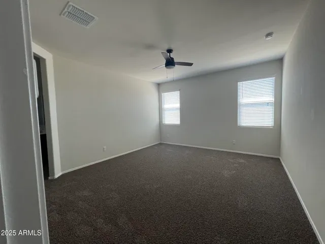 an empty room that has a window