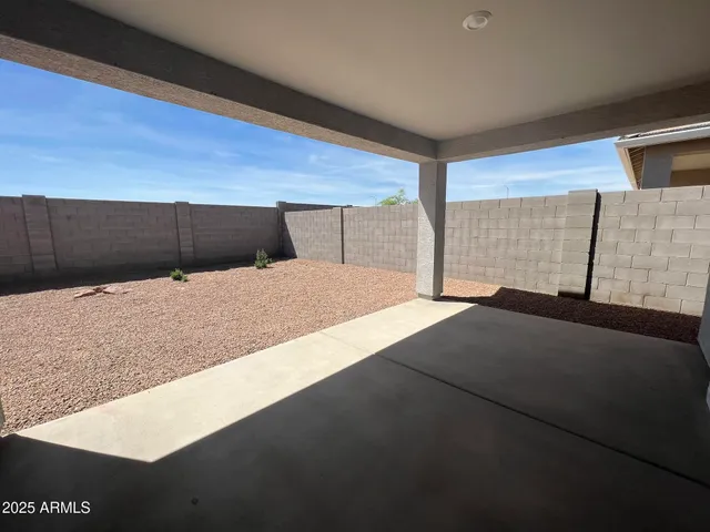 a living room with a bed