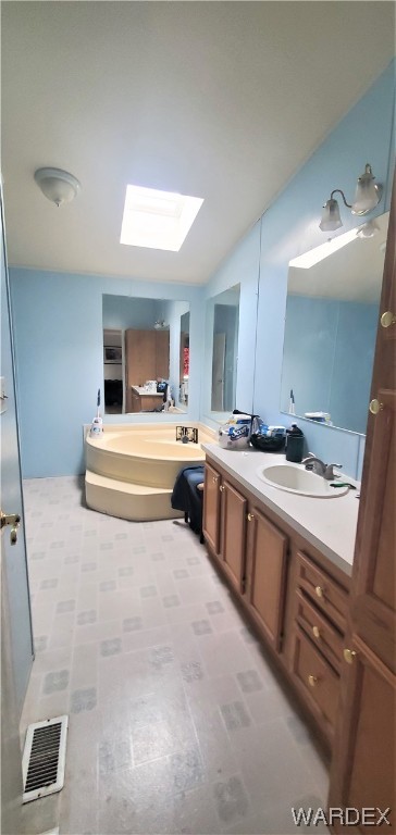 5809 Elfrida Road Golden Valley, AZ 86413 - Photo 28 of 64 a large white bathroom with a sink and dishwasher