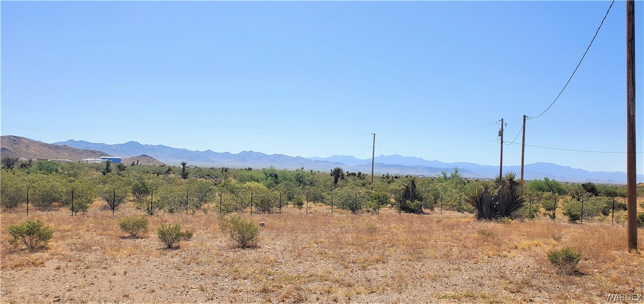 5809 Elfrida Road Golden Valley, AZ 86413 - Photo 50 of 64 a view of a lake with a mountain