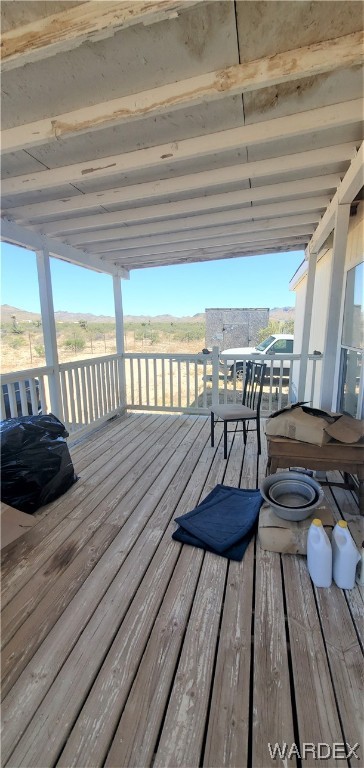 5809 Elfrida Road Golden Valley, AZ 86413 - Photo 9 of 64 a view of a chairs and table on the wooden floor