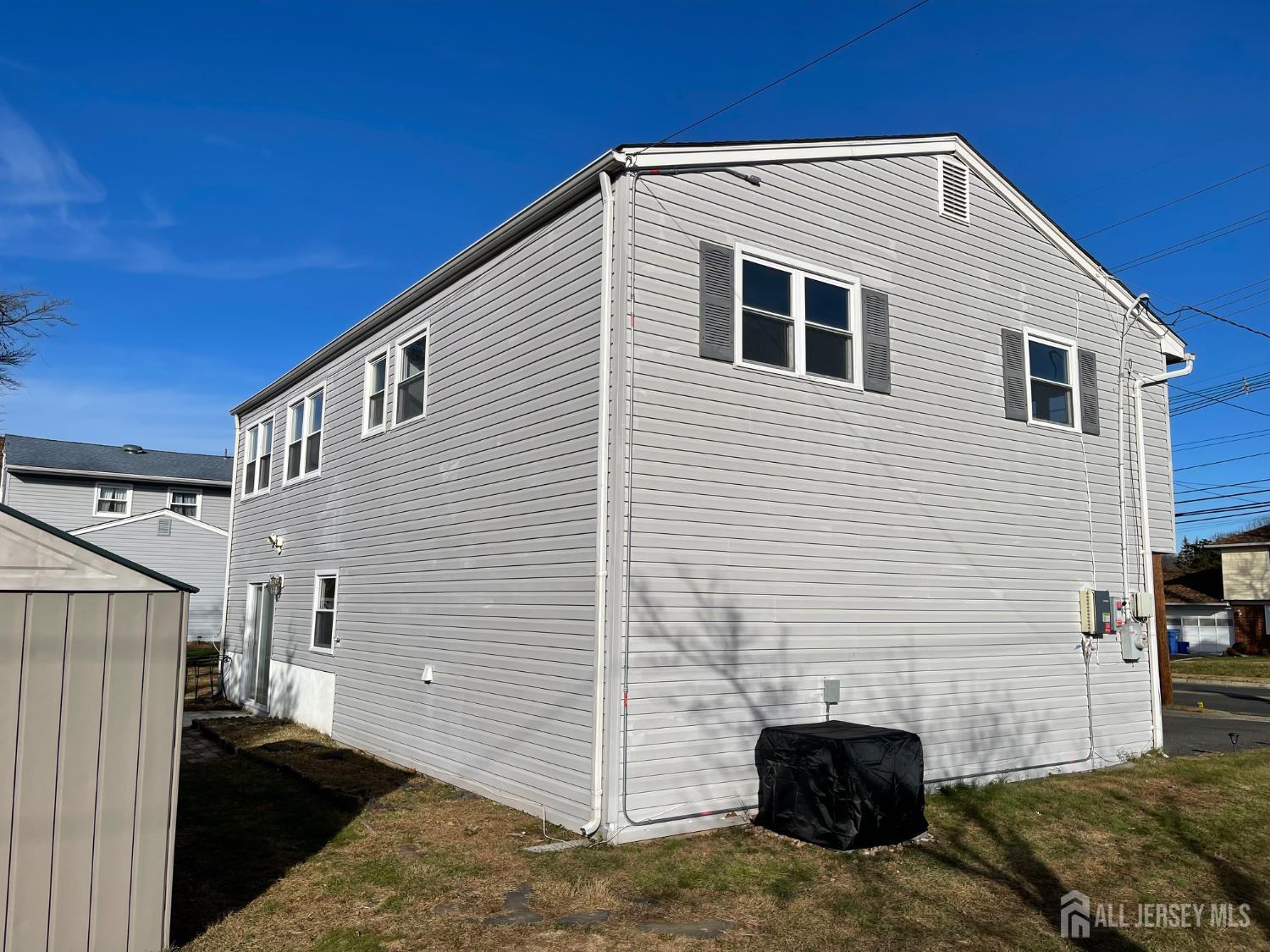 57 Greenbrook Road Middlesex, NJ 08846 - Photo 16 of 18 a view of a house with a yard