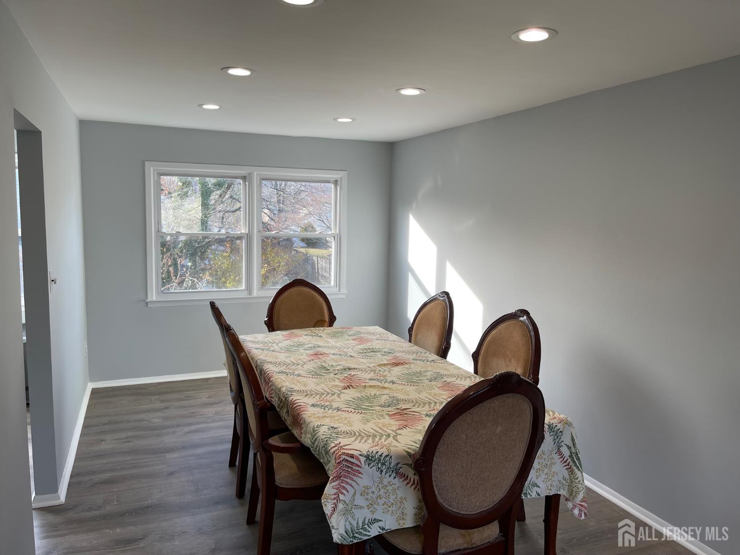 57 Greenbrook Road Middlesex, NJ 08846 - Photo 8 of 18 a dining room with furniture and window