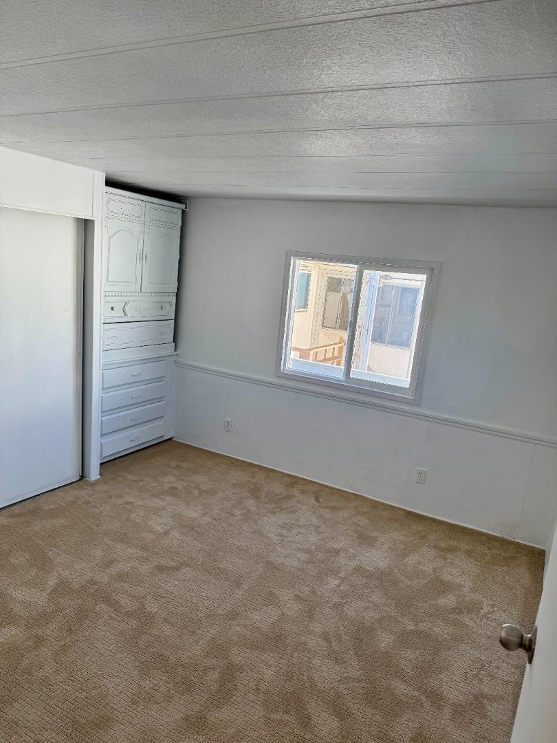 12350 Christensen Road, Unit 76 Salinas, CA 93907 - Photo 11 of 19 a view of an empty room with a window