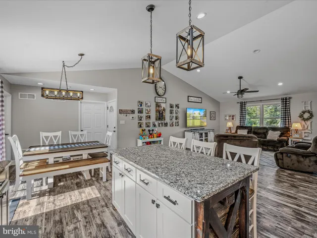 a kitchen with a counter space cabinets and appliances