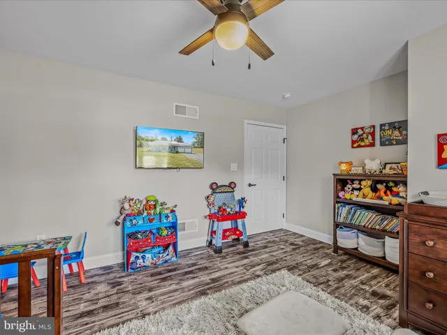 a view of a play room with toys and toys
