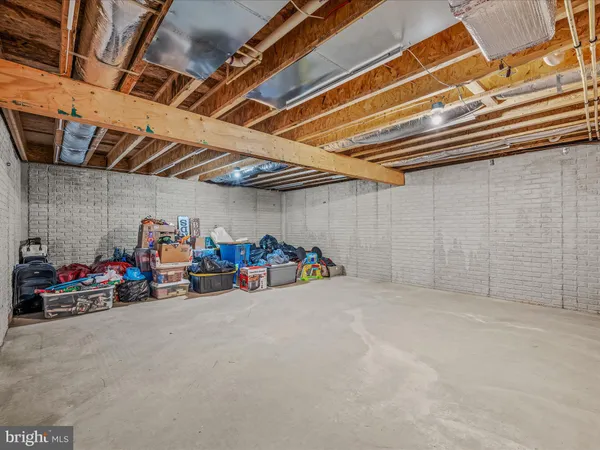 a children room with toys and a couch