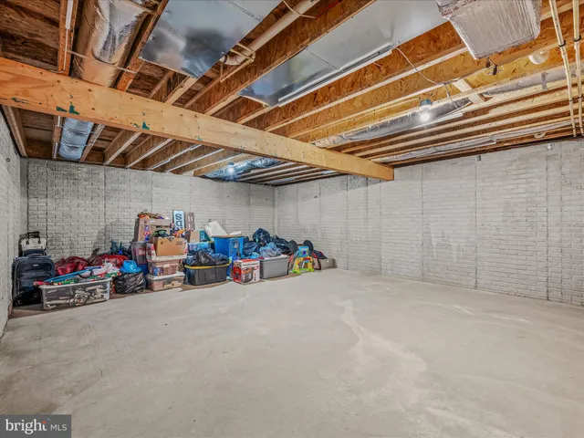 a children room with toys and a couch