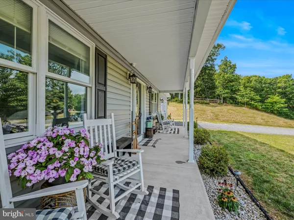 a garden view with a seating space