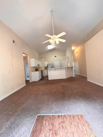a view of a kitchen with a dishwasher and a cabinets