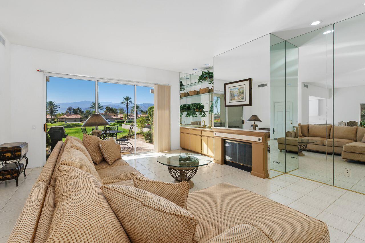31 Pebble Beach Drive Rancho Mirage, CA 92270 - Photo 2 of 49 a living room with furniture and a couch