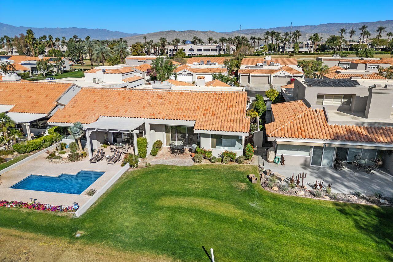 31 Pebble Beach Drive Rancho Mirage, CA 92270 - Photo 34 of 49 an aerial view of a house with swimming pool garden and outdoor seating