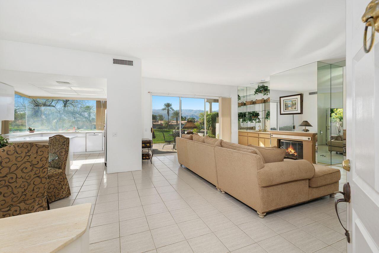 31 Pebble Beach Drive Rancho Mirage, CA 92270 - Photo 7 of 49 a living room with furniture and a large window
