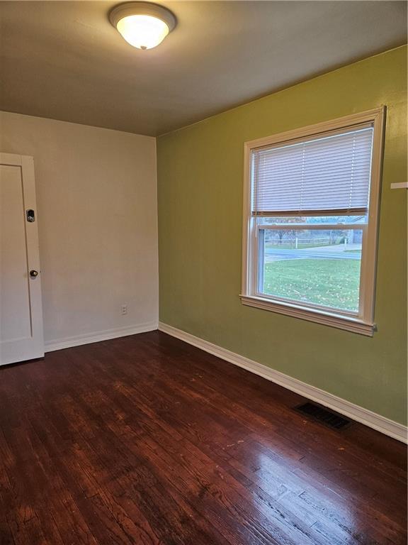 214 South Eberhart Road Butler, PA 16001 - Photo 13 of 27 a view of an empty room with wooden floor and a window