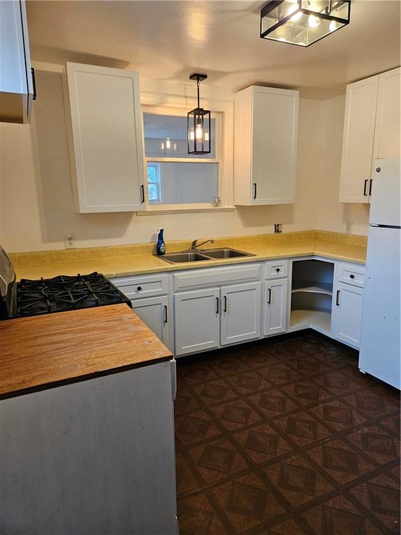 214 South Eberhart Road Butler, PA 16001 - Photo 7 of 27 a kitchen with sink and cabinets
