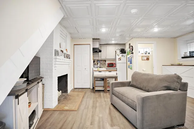 a bathroom with a toilet a sink and a mirror