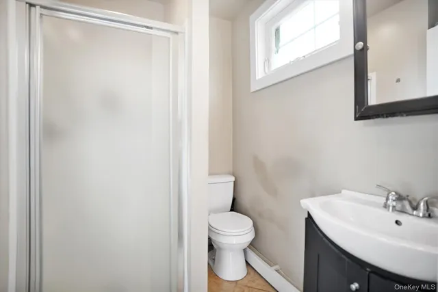 a bed room with furniture and a flat screen tv