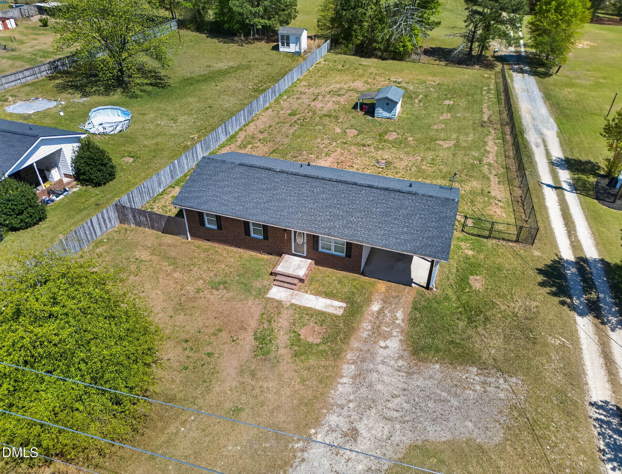 6086 Red Hill Church Road Coats, NC 27521 - Photo 43 of 44 a view of a yard with chairs