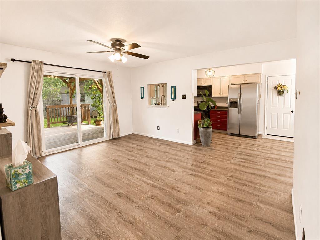404 Old Mansfield Road Keene, TX 76059 - Photo 5 of 33 Living Area and Kitchen from hallway