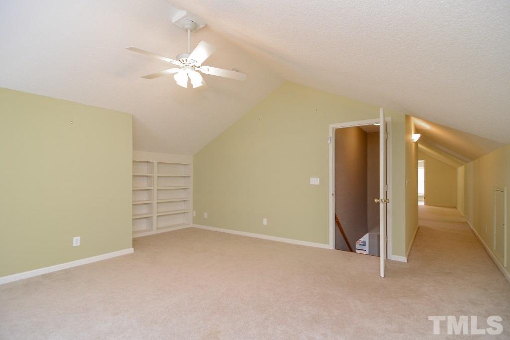9798 Covered Bridge Road Zebulon, NC 27597 - Photo 25 of 25 Built-in shelving on two walls.
