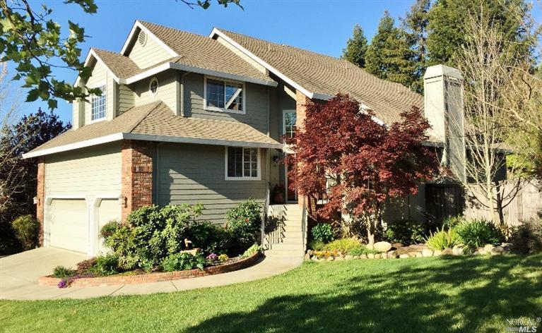 1519 San Ramon Way Santa Rosa, CA 95409 - Photo 1 of 1 a front view of a house with a yard