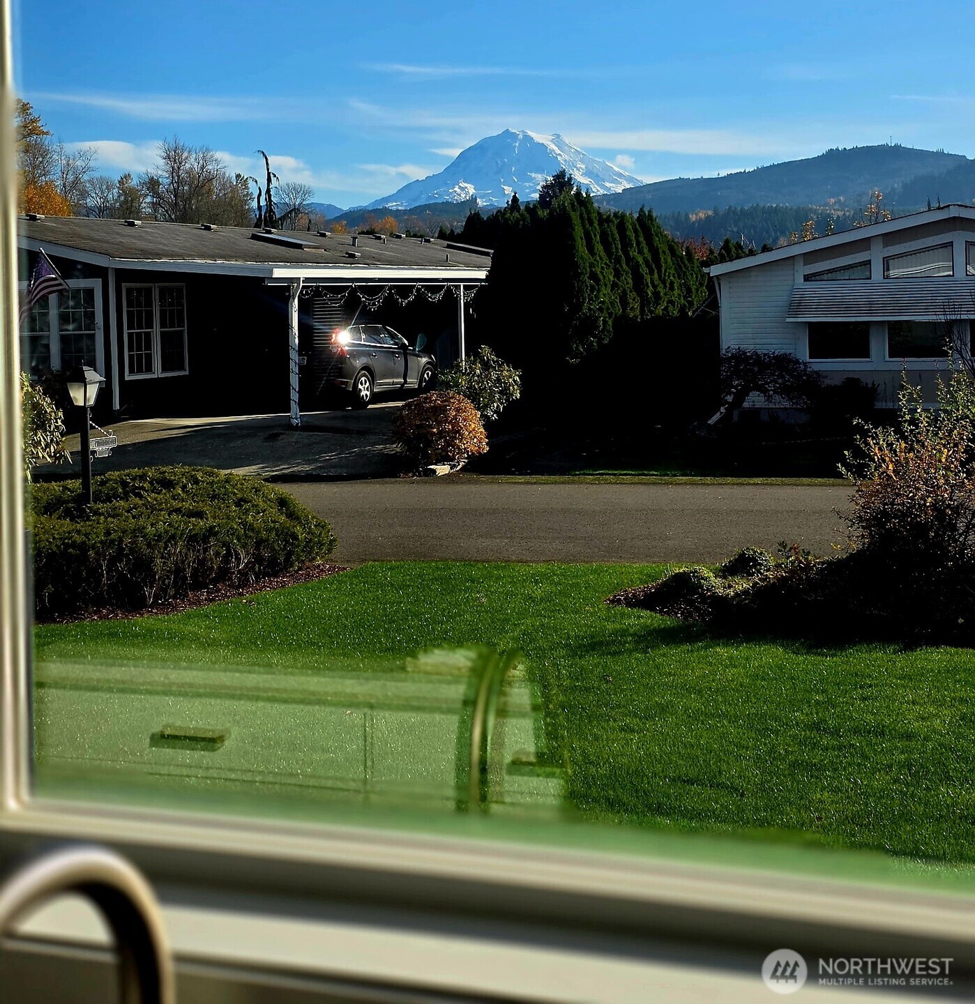 836 South Harmon Way, Unit 73 Orting, WA 98360 - Photo 5 of 30 a front view of house with a garden