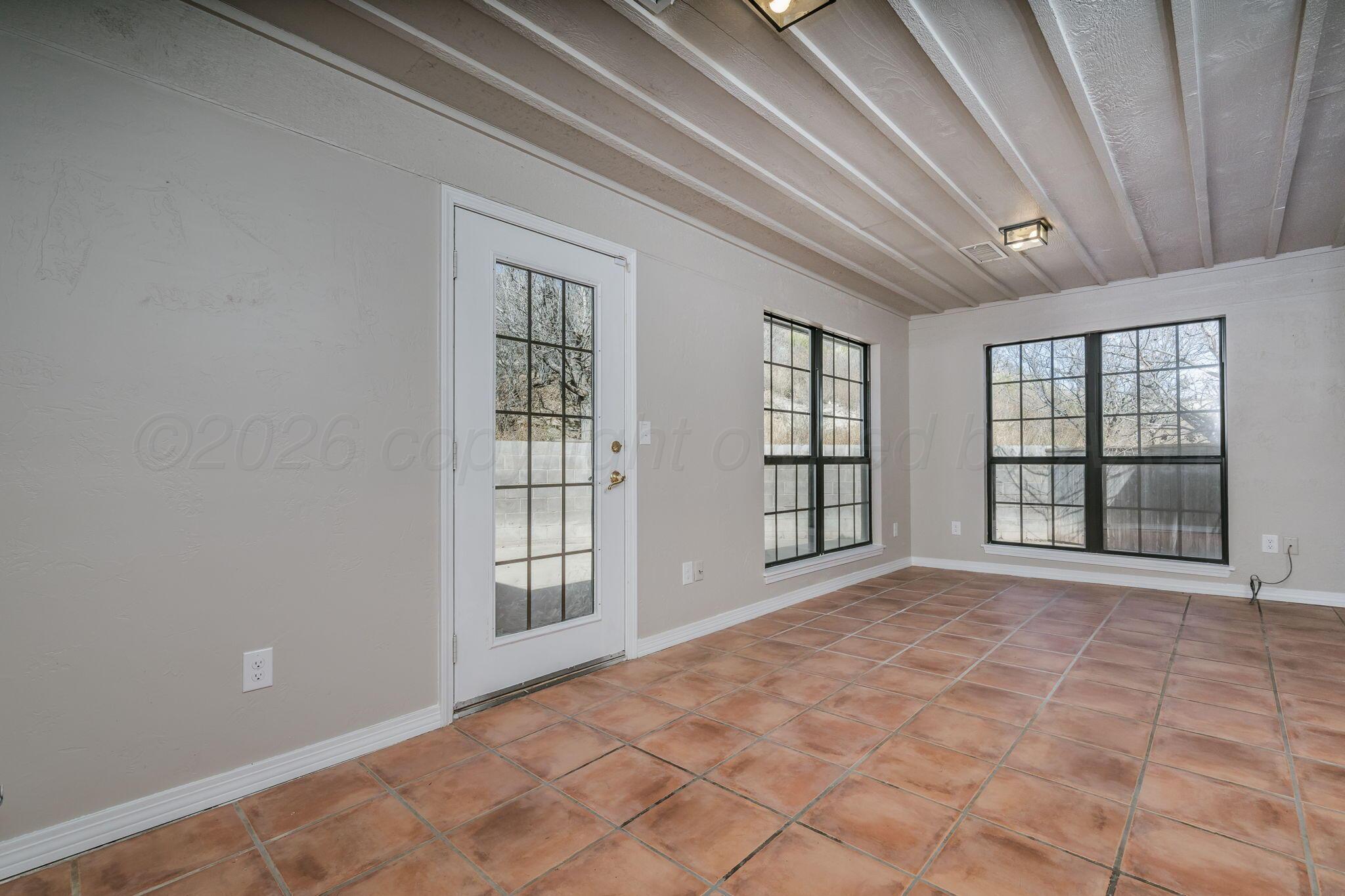 15 Lancaster Road Amarillo, TX 79124 - Photo 27 of 59 a view of an empty room with a window
