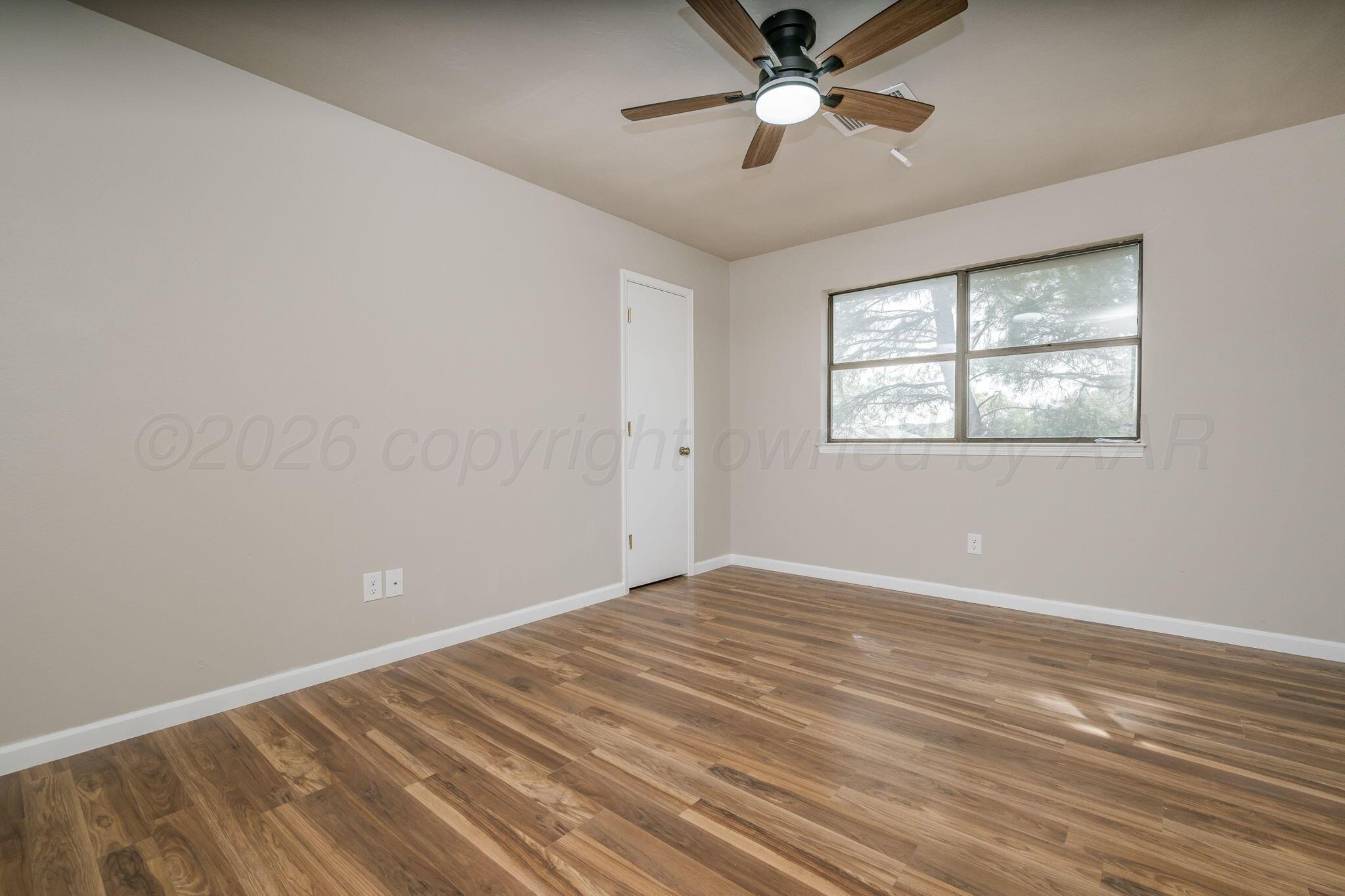 15 Lancaster Road Amarillo, TX 79124 - Photo 31 of 59 a view of an empty room with a window