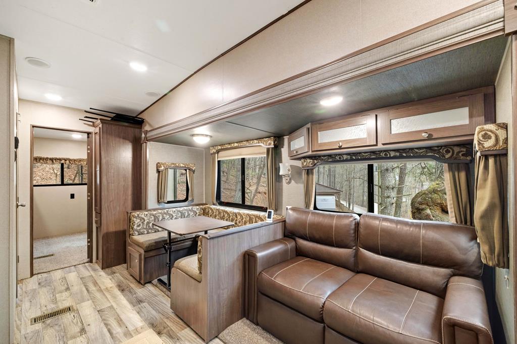 341 25th Street Ellijay, GA 30540 - Photo 4 of 15 a living room with furniture and a table