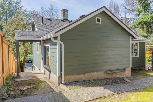 a bathroom with a bathtub a sink and a shower