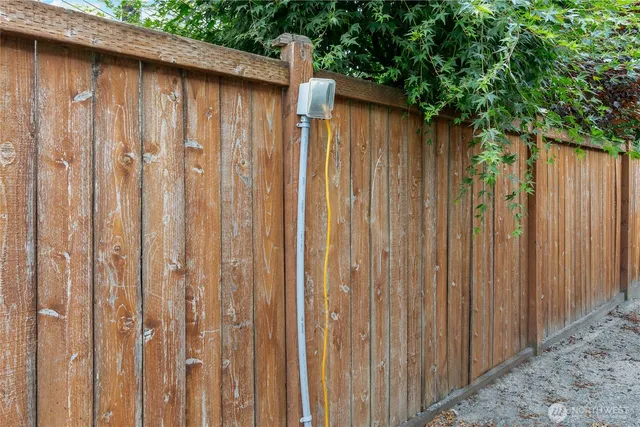 a view of a wooden fence