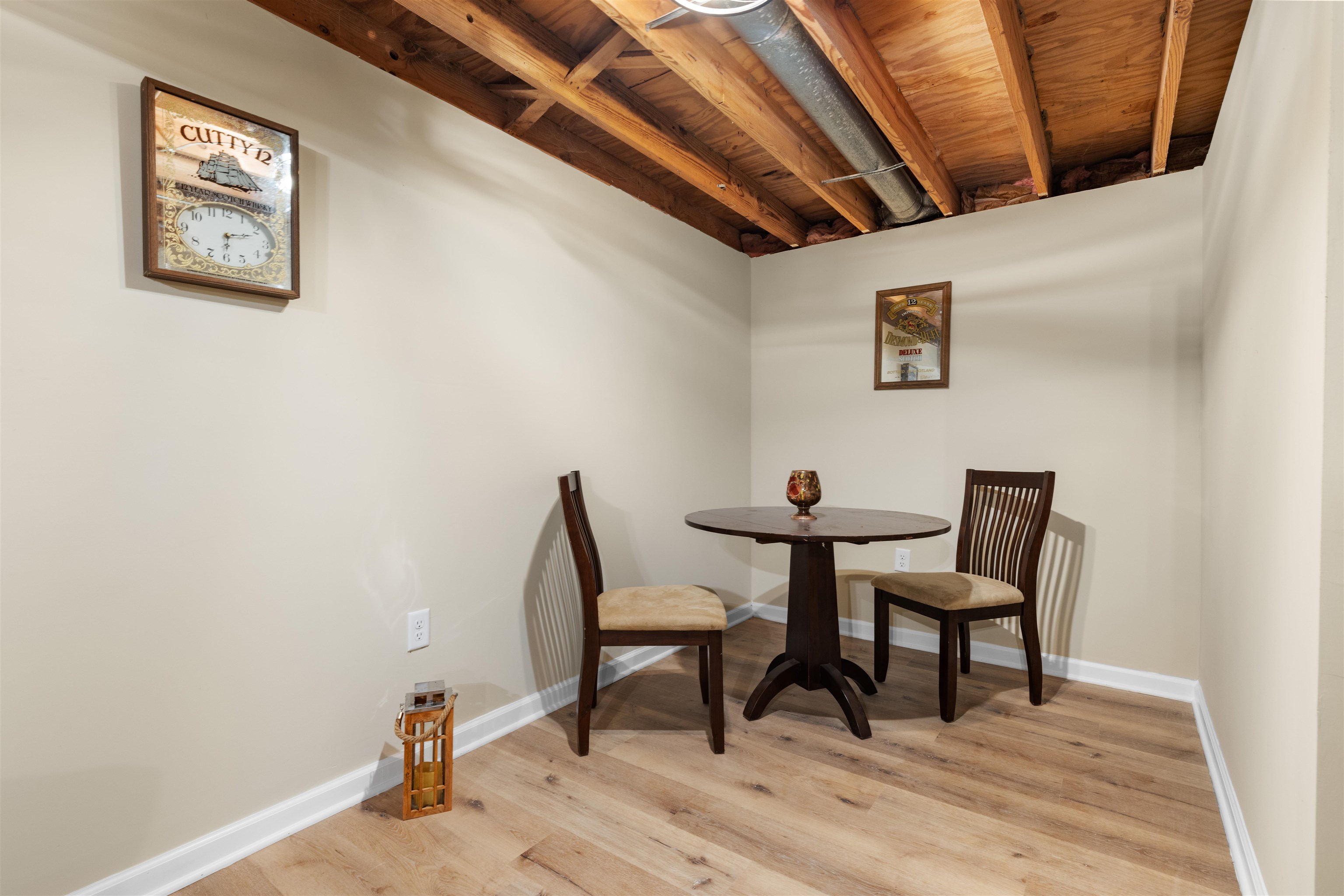 4830 Crown Point Circle Roscoe, IL 61073 - Photo 15 of 24 a view of a room with furniture and wooden floor
