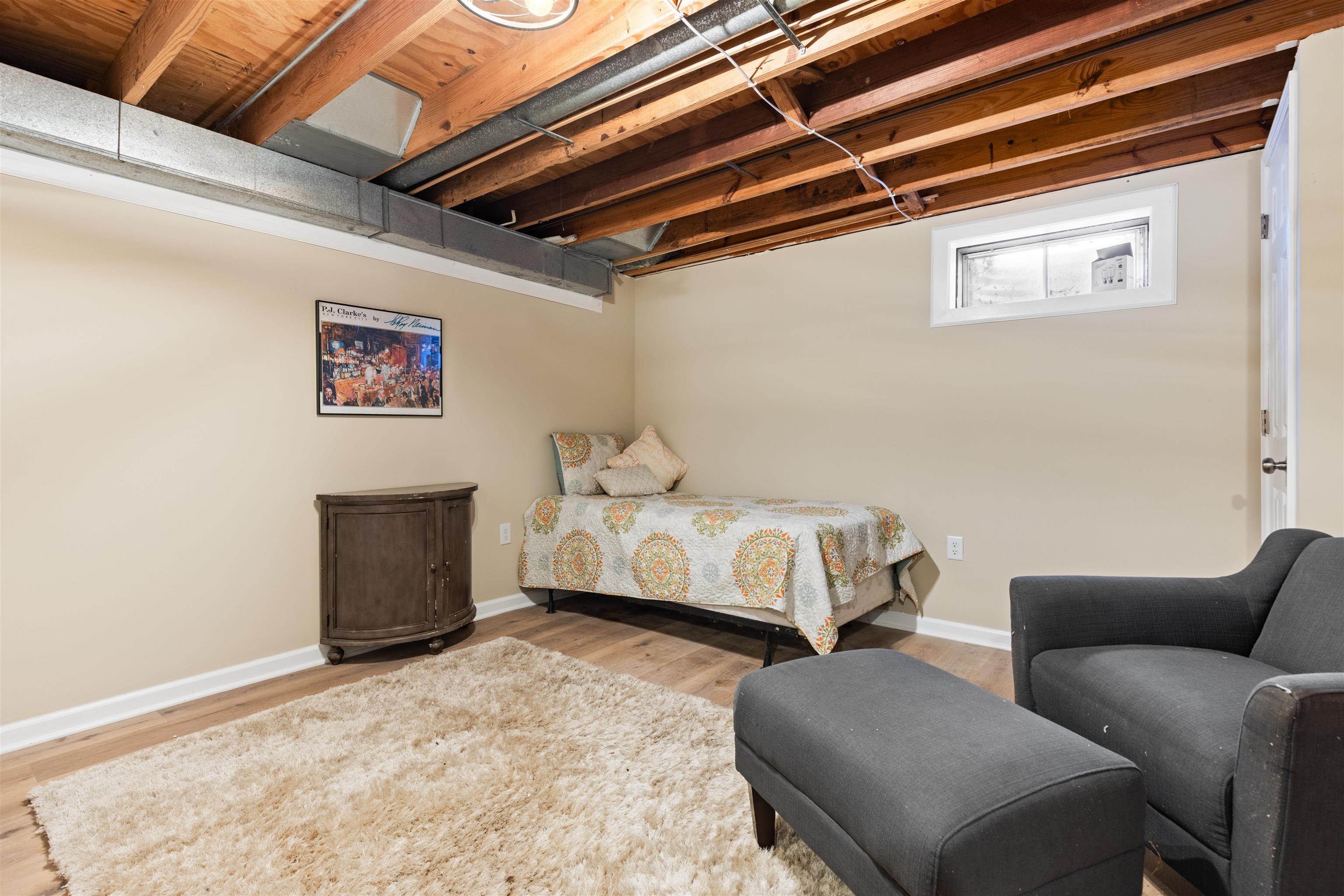 4830 Crown Point Circle Roscoe, IL 61073 - Photo 16 of 24 a bedroom with furniture and a bed