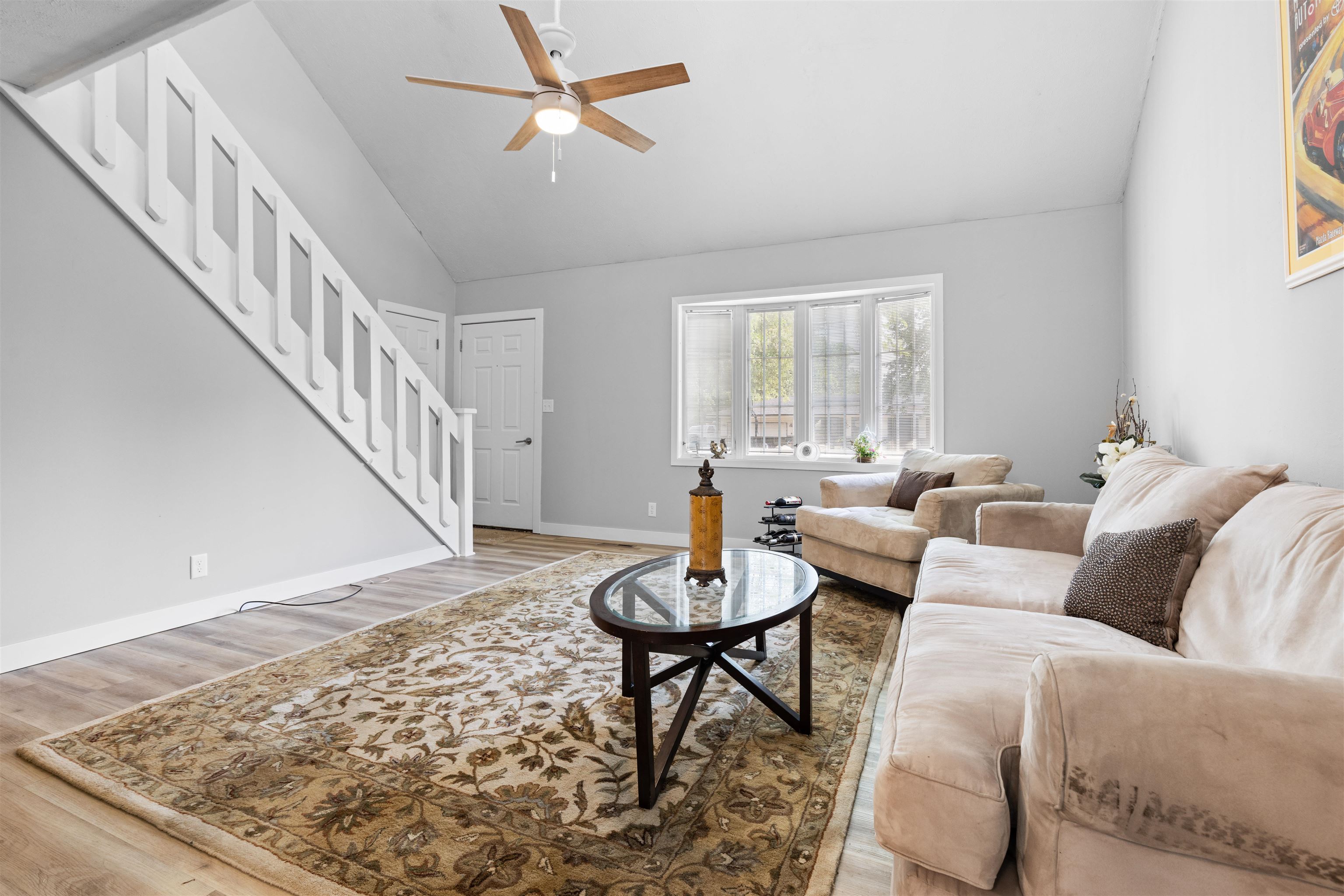 4830 Crown Point Circle Roscoe, IL 61073 - Photo 2 of 24 a living room with furniture and a rug
