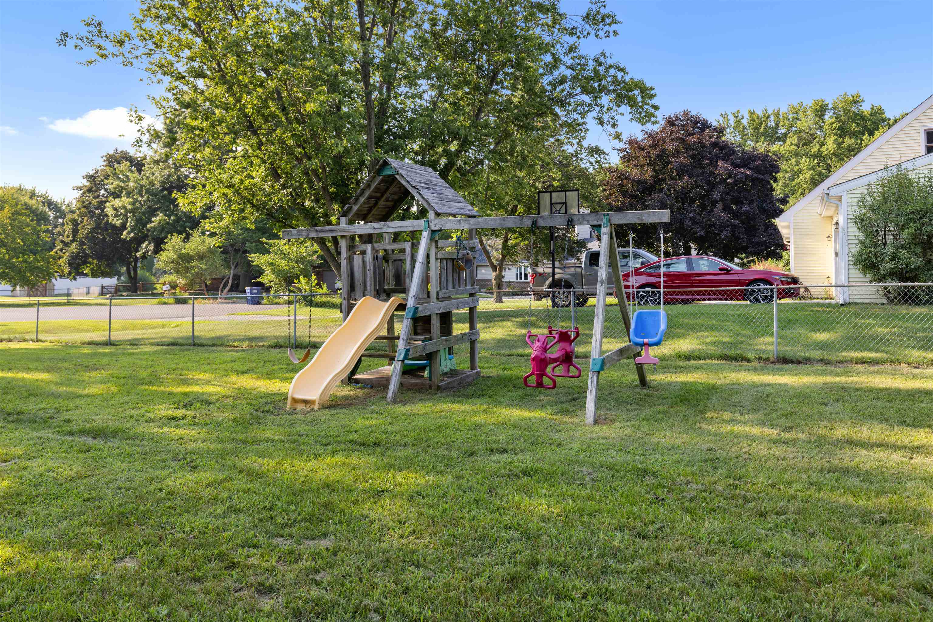 4830 Crown Point Circle Roscoe, IL 61073 - Photo 21 of 24 a view of a house with a big yard and sitting area