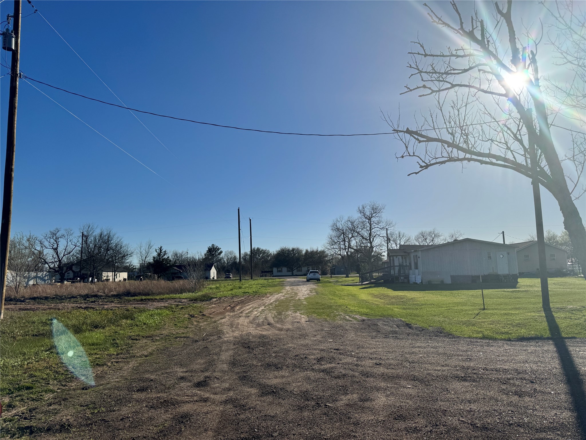 0 Tolbert Street Needville, TX 77461 - Photo 5 of 6 Lots view from the dirt road (Tolbert St) to the main road