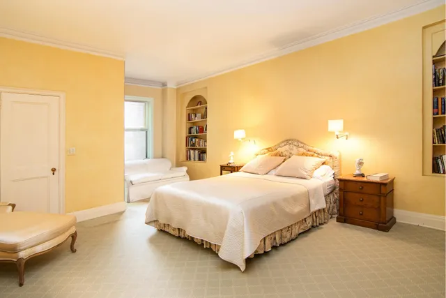 a view of a hallway with washer and dryer