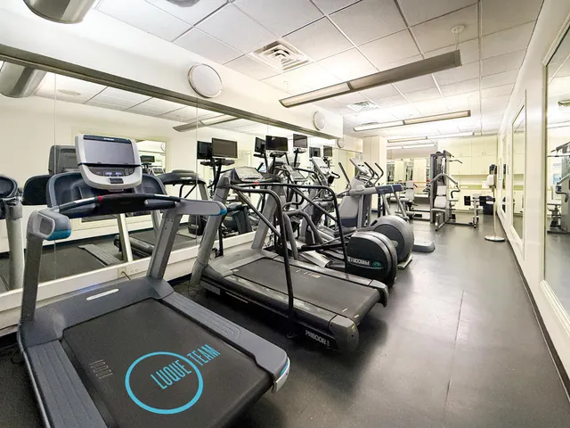 a view of balcony with furniture