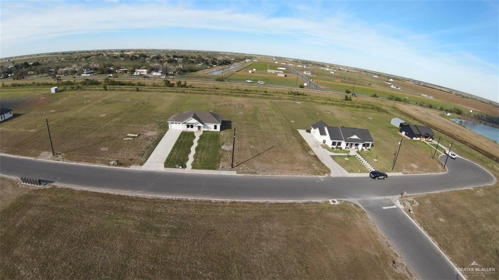 20279 Isabella Kristine Street Edcouch, TX 78538 - Photo 4 of 7 an aerial view of residential houses with outdoor space