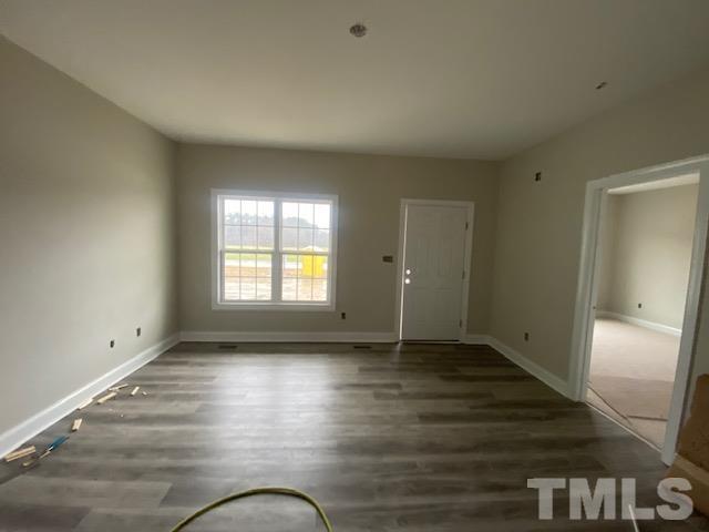 2927 Hobson Road Dunn, NC 28334 - Photo 3 of 12 a view of empty room with wooden floor