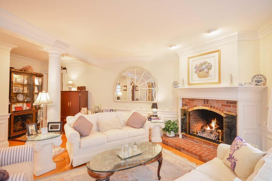 80 Farm Valley Road Osterville, MA 02655 - Photo 17 of 47 a living room with furniture and a fireplace