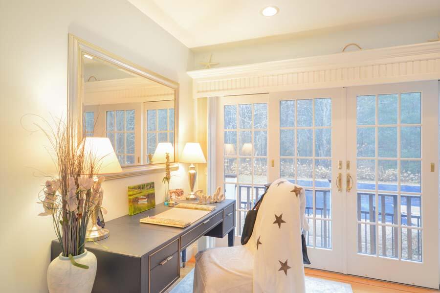 80 Farm Valley Road Osterville, MA 02655 - Photo 22 of 47 a view of a kitchen with granite countertop a sink a dining table and chairs