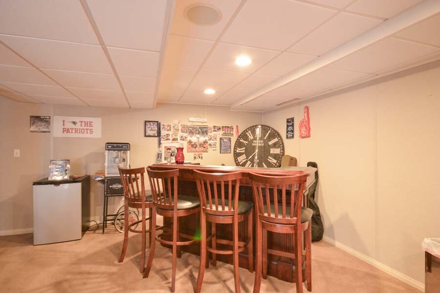 80 Farm Valley Road Osterville, MA 02655 - Photo 36 of 47 a view of a dining room with furniture and chandelier