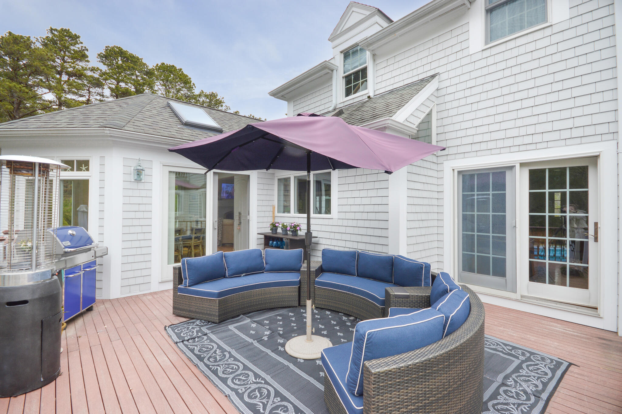 80 Farm Valley Road Osterville, MA 02655 - Photo 5 of 47 a outdoor living area with furniture and a rug