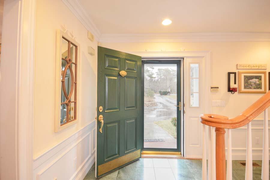 80 Farm Valley Road Osterville, MA 02655 - Photo 6 of 47 a view of a hallway with windows and entryway