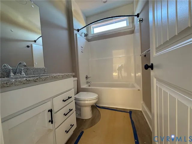 a view of an ocean and a mountain from a balcony